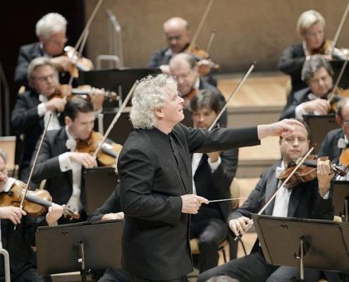 Simon Rattle und die Berliner Philharmoniker Foto: Monika Rittershaus